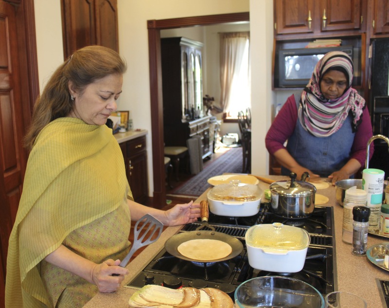 ["Ruby Abdulla, b. 1949, is an immigrant from southern India (via Canada). She was born in Madurai. Abdulla is Muslim and a member of Indias Memon community, a cultural minority. She is active with the Islamic Center in Charleston and is a skilled home cook, preparing traditional southern and northern Indian dishes. Nariman Farah is a Charleston resident from Sudan. She is Mulsim and a member of the Islamic Center in Charleston."]%