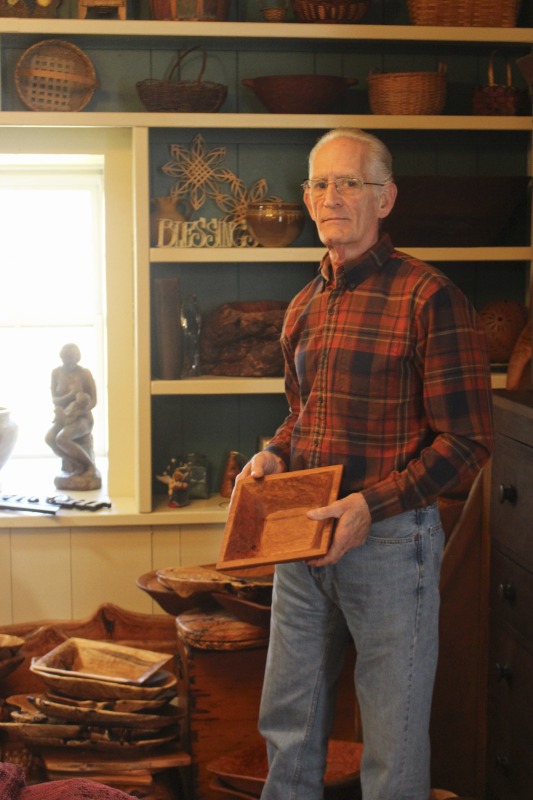 ["Charles Steven Adams is a hand-hewn bowl carver living in Martinsburg, WV. Originally from Nitro, WV, Steve worked as a social worker and took up bowl carving in retirement. He also makes wood furniture and hand-hewn carved sinks. His wife Jan works with him at local craft shows. Adams also teaches bowl carving workshops at his woodshop. http://www.charlesstevenadams.com/index.php."]%