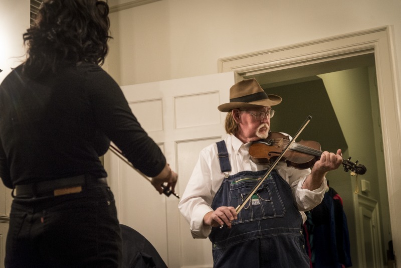 ["On the evening of Wednesday, January 16, 2019, The West Virginia Folklife Program hosted a showcase of their Folklife Apprenticeship Program, featuring master gospel and blues musician Doris Fields (aka Lady D) with apprentice Xavier Oglesby, and master old-time fiddler John D. Morris with apprentice Jen Iskow. The free event was held from 5:30-7:30pm at the historic MacFarland-Hubbard House, headquarters of the West Virginia Humanities Council (1310 Kanawha Blvd. E), in Charleston. The evening included musical performances by the two pairs and a question-answer session, followed by a reception.Doris Fields, who performs as Lady D, is known as West Virginias First Lady of Soul. A West Virginia native, she began singing in church choir as a child and has performed original and traditional blues, gospel, R&B, and soul across the state and country, including for the Obama for Change Inaugural Ball. Xavier Oglesby grew up singing in the black Pentecostal church and has performed in local a capella and theatre groups. He recently recorded voiceovers for the New River Gorge African American Heritage Auto Tour. Both Fields and Oglesby reside in Beckley.John D. Morris, of Ivydale, is an acclaimed West Virginia fiddler and tradition bearer who has been honored by the Augusta Heritage Center, the West Virginia Music Hall of Fame, the West Virginia Fiddler Award, and a National Heritage Fellowship for his role in sustaining the tradition. Jen Iskow, of Thomas, is a West Virginia University alumni, community organizer, artist, and designer at Beartown Design Studio. She has studied with numerous masters of Appalachian old-time fiddle.The West Virginia Folklife Apprenticeship Program offers a stipend to West Virginia master traditional artists or tradition bearers working with qualified apprentices on a year-long in-depth apprenticeship in their cultural expression or traditional art form. These apprenticeships aim to facilitate the transmission of techniques and artistry of the forms, as well as their histories and traditions. 2018 was the first year of the biennial Folklife Apprenticeship Program.Read more about the apprenticeship pairs on the West Virginia Folklife blog:https://wvfolklife.org/2018/12/03/2018-master-artist-apprentice-feature-doris-fields-aka-lady-d-xavier-oglesby-blues-black-gospel/https://wvfolklife.org/2018/11/09/2018-master-artist-apprentice-feature-john-morris-jen-iskow-old-time-fiddling-and-stories-of-clay-county/"]%