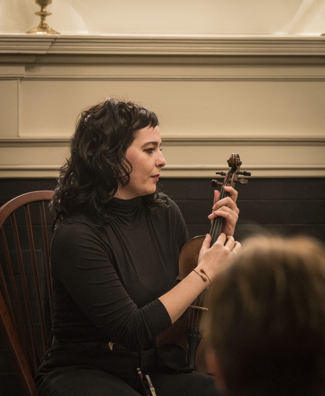 On the evening of Wednesday, January 16, 2019, The West Virginia Folklife Program hosted a showcase of their Folklife Apprenticeship Program, featuring master gospel and blues musician Doris Fields (aka Lady D) with apprentice Xavier Oglesby, and master old-time fiddler John D. Morris with apprentice Jen Iskow. The free event was held from 5:30-7:30pm at the historic MacFarland-Hubbard House, headquarters of the West Virginia Humanities Council (1310 Kanawha Blvd. E), in Charleston. The evening included musical performances by the two pairs and a question-answer session, followed by a reception.Doris Fields, who performs as Lady D, is known as West Virginias First Lady of Soul. A West Virginia native, she began singing in church choir as a child and has performed original and traditional blues, gospel, R&B, and soul across the state and country, including for the Obama for Change Inaugural Ball. Xavier Oglesby grew up singing in the black Pentecostal church and has performed in local a capella and theatre groups. He recently recorded voiceovers for the New River Gorge African American Heritage Auto Tour. Both Fields and Oglesby reside in Beckley.John D. Morris, of Ivydale, is an acclaimed West Virginia fiddler and tradition bearer who has been honored by the Augusta Heritage Center, the West Virginia Music Hall of Fame, the West Virginia Fiddler Award, and a National Heritage Fellowship for his role in sustaining the tradition. Jen Iskow, of Thomas, is a West Virginia University alumni, community organizer, artist, and designer at Beartown Design Studio. She has studied with numerous masters of Appalachian old-time fiddle.The West Virginia Folklife Apprenticeship Program offers a stipend to West Virginia master traditional artists or tradition bearers working with qualified apprentices on a year-long in-depth apprenticeship in their cultural expression or traditional art form. These apprenticeships aim to facilitate the transmission of techniques and artistry of the forms, as well as their histories and traditions. 2018 was the first year of the biennial Folklife Apprenticeship Program.Read more about the apprenticeship pairs on the West Virginia Folklife blog:https://wvfolklife.org/2018/12/03/2018-master-artist-apprentice-feature-doris-fields-aka-lady-d-xavier-oglesby-blues-black-gospel/https://wvfolklife.org/2018/11/09/2018-master-artist-apprentice-feature-john-morris-jen-iskow-old-time-fiddling-and-stories-of-clay-county/