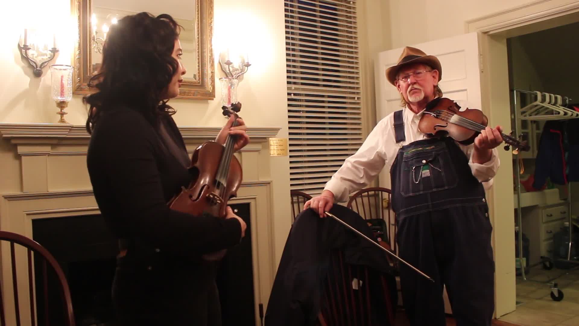 ["On the evening of Wednesday, January 16, 2019, The West Virginia Folklife Program hosted a showcase of their Folklife Apprenticeship Program, featuring master gospel and blues musician Doris Fields (aka Lady D) with apprentice Xavier Oglesby, and master old-time fiddler John D. Morris with apprentice Jen Iskow. The free event was held from 5:30-7:30pm at the historic MacFarland-Hubbard House, headquarters of the West Virginia Humanities Council (1310 Kanawha Blvd. E), in Charleston. The evening included musical performances by the two pairs and a question-answer session, followed by a reception.Doris Fields, who performs as Lady D, is known as West Virginias First Lady of Soul. A West Virginia native, she began singing in church choir as a child and has performed original and traditional blues, gospel, R&B, and soul across the state and country, including for the Obama for Change Inaugural Ball. Xavier Oglesby grew up singing in the black Pentecostal church and has performed in local a capella and theatre groups. He recently recorded voiceovers for the New River Gorge African American Heritage Auto Tour. Both Fields and Oglesby reside in Beckley.John D. Morris, of Ivydale, is an acclaimed West Virginia fiddler and tradition bearer who has been honored by the Augusta Heritage Center, the West Virginia Music Hall of Fame, the West Virginia Fiddler Award, and a National Heritage Fellowship for his role in sustaining the tradition. Jen Iskow, of Thomas, is a West Virginia University alumni, community organizer, artist, and designer at Beartown Design Studio. She has studied with numerous masters of Appalachian old-time fiddle.The West Virginia Folklife Apprenticeship Program offers a stipend to West Virginia master traditional artists or tradition bearers working with qualified apprentices on a year-long in-depth apprenticeship in their cultural expression or traditional art form. These apprenticeships aim to facilitate the transmission of techniques and artistry of the forms, as well as their histories and traditions. 2018 was the first year of the biennial Folklife Apprenticeship Program.Read more about the apprenticeship pairs on the West Virginia Folklife blog:https://wvfolklife.org/2018/12/03/2018-master-artist-apprentice-feature-doris-fields-aka-lady-d-xavier-oglesby-blues-black-gospel/https://wvfolklife.org/2018/11/09/2018-master-artist-apprentice-feature-john-morris-jen-iskow-old-time-fiddling-and-stories-of-clay-county/"]%