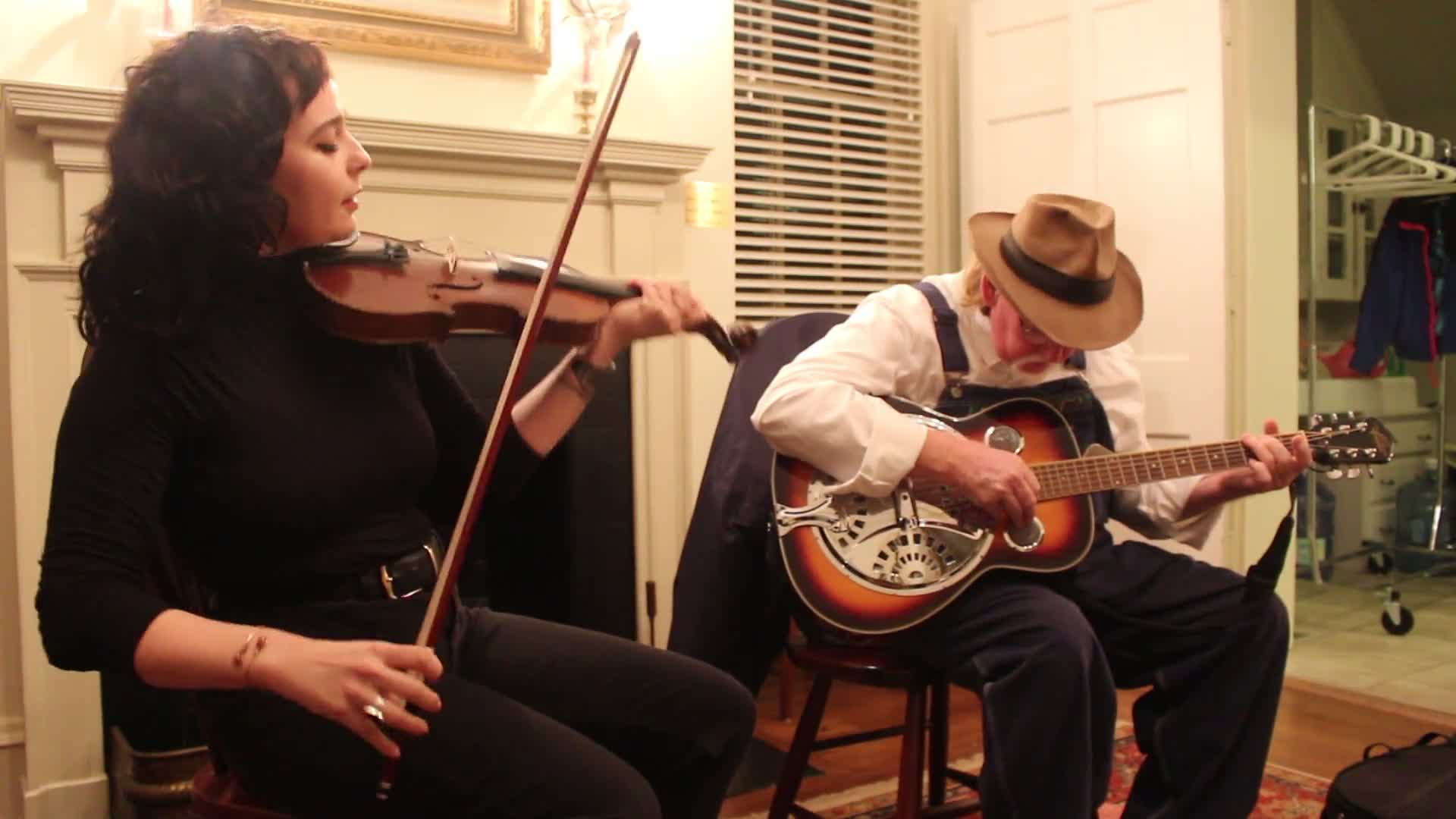 ["On the evening of Wednesday, January 16, 2019, The West Virginia Folklife Program hosted a showcase of their Folklife Apprenticeship Program, featuring master gospel and blues musician Doris Fields (aka Lady D) with apprentice Xavier Oglesby, and master old-time fiddler John D. Morris with apprentice Jen Iskow. The free event was held from 5:30-7:30pm at the historic MacFarland-Hubbard House, headquarters of the West Virginia Humanities Council (1310 Kanawha Blvd. E), in Charleston. The evening included musical performances by the two pairs and a question-answer session, followed by a reception.Doris Fields, who performs as Lady D, is known as West Virginias First Lady of Soul. A West Virginia native, she began singing in church choir as a child and has performed original and traditional blues, gospel, R&B, and soul across the state and country, including for the Obama for Change Inaugural Ball. Xavier Oglesby grew up singing in the black Pentecostal church and has performed in local a capella and theatre groups. He recently recorded voiceovers for the New River Gorge African American Heritage Auto Tour. Both Fields and Oglesby reside in Beckley.John D. Morris, of Ivydale, is an acclaimed West Virginia fiddler and tradition bearer who has been honored by the Augusta Heritage Center, the West Virginia Music Hall of Fame, the West Virginia Fiddler Award, and a National Heritage Fellowship for his role in sustaining the tradition. Jen Iskow, of Thomas, is a West Virginia University alumni, community organizer, artist, and designer at Beartown Design Studio. She has studied with numerous masters of Appalachian old-time fiddle.The West Virginia Folklife Apprenticeship Program offers a stipend to West Virginia master traditional artists or tradition bearers working with qualified apprentices on a year-long in-depth apprenticeship in their cultural expression or traditional art form. These apprenticeships aim to facilitate the transmission of techniques and artistry of the forms, as well as their histories and traditions. 2018 was the first year of the biennial Folklife Apprenticeship Program.Read more about the apprenticeship pairs on the West Virginia Folklife blog:https://wvfolklife.org/2018/12/03/2018-master-artist-apprentice-feature-doris-fields-aka-lady-d-xavier-oglesby-blues-black-gospel/https://wvfolklife.org/2018/11/09/2018-master-artist-apprentice-feature-john-morris-jen-iskow-old-time-fiddling-and-stories-of-clay-county/"]%