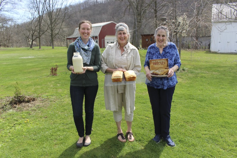 ["Genevieve (Jenny) Bardwell and Susan Ray Brown of Mount Morris, Pennsylvania led an apprenticeship in salt rising bread with Amy Dawson of Lost Creek, West Virginia as part of the 2018 West Virginia Folklife Apprenticeship Program, supported in part by the National Endowment for the Arts. Master salt rising bread baker Genevieve (Jenny) Bardwell holds an A.S. in culinary arts from the Culinary Institute of America, and a B.S. and M.S. in plant pathology from the University of Massachusetts. Jenny is the co-author of Salt Rising Bread: Recipes and Heartfelt Stories of a Nearly Lost Appalachian Tradition and was the co-founder of Rising Creek Bakery in Mount Morris, Pennsylvania, both with Susan Ray Brown. Jenny has engaged in a deep, decades-long study of the unique labor-intensive Appalachian bread, focusing particularly on the scientific process and researching analog breads in other cultures. In 2017, she was awarded a Folk and Traditional Arts Apprenticeship Grant from the Pennsylvania Council of the Arts to lead a salt rising bread apprenticeship with baker Antonio Archer and in 2018, she was awarded an Folklife Apprenticeship Grant from the West Virginia Folklife Program with fellow baker Susan Ray Brown and apprentice Amy Dawson.Master salt rising bread baker Susan Ray Brown grew up in southern West Virginia, and her family roots go back nearly 300 years in her beloved Mountain State. She holds a B.A. in sociology/anthropology from West Virginia University. Susan is the co-author of Salt Rising Bread: Recipes and Heartfelt Stories of a Nearly Lost Appalachian Tradition and was the co-founder of Rising Creek Bakery in Mount Morris, PA, both with Jenny Bardwell. Susan has engaged in a deep, decades-long study of the unique labor-intensive Appalachian bread, recording oral histories, gathering recipes, conducting scientific studies, and constantly experimenting through her own baking. Find more on her website at www.saltrisingbread.net.Amy Dawson is a native of Lost Creek, West Virginia. She holds a B.S. in geology from West Virginia University and a J.D. from the College of Law at West Virginia University. She manages and co-owns Lost Creek Farm with her partner Mike Costello, hosting travelling kitchen/pop-up dinner events around the greater Appalachian region. In 2018, Lost Creek Farm was featured on CNNs Parts Unknown with Anthony Bourdain.See our feature on Bardwell and Browns apprenticeship with Dawson here: https://wvfolklife.org/2018/11/12/2018-master-artists-apprentice-feature-genevieve-bardwell-susan-ray-brown-amy-dawson-salt-rising-bread/"]%