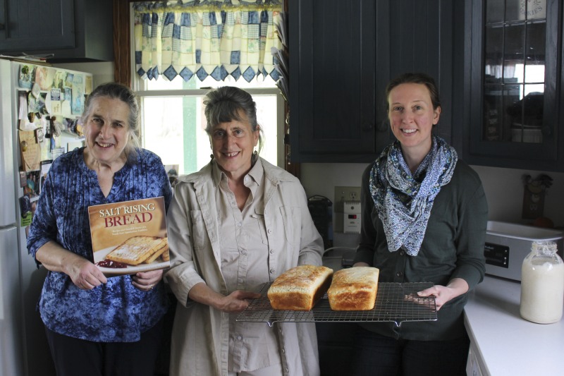 ["Genevieve (Jenny) Bardwell and Susan Ray Brown of Mount Morris, Pennsylvania led an apprenticeship in salt rising bread with Amy Dawson of Lost Creek, West Virginia as part of the 2018 West Virginia Folklife Apprenticeship Program, supported in part by the National Endowment for the Arts. Master salt rising bread baker Genevieve (Jenny) Bardwell holds an A.S. in culinary arts from the Culinary Institute of America, and a B.S. and M.S. in plant pathology from the University of Massachusetts. Jenny is the co-author of Salt Rising Bread: Recipes and Heartfelt Stories of a Nearly Lost Appalachian Tradition and was the co-founder of Rising Creek Bakery in Mount Morris, Pennsylvania, both with Susan Ray Brown. Jenny has engaged in a deep, decades-long study of the unique labor-intensive Appalachian bread, focusing particularly on the scientific process and researching analog breads in other cultures. In 2017, she was awarded a Folk and Traditional Arts Apprenticeship Grant from the Pennsylvania Council of the Arts to lead a salt rising bread apprenticeship with baker Antonio Archer and in 2018, she was awarded an Folklife Apprenticeship Grant from the West Virginia Folklife Program with fellow baker Susan Ray Brown and apprentice Amy Dawson.Master salt rising bread baker Susan Ray Brown grew up in southern West Virginia, and her family roots go back nearly 300 years in her beloved Mountain State. She holds a B.A. in sociology/anthropology from West Virginia University. Susan is the co-author of Salt Rising Bread: Recipes and Heartfelt Stories of a Nearly Lost Appalachian Tradition and was the co-founder of Rising Creek Bakery in Mount Morris, PA, both with Jenny Bardwell. Susan has engaged in a deep, decades-long study of the unique labor-intensive Appalachian bread, recording oral histories, gathering recipes, conducting scientific studies, and constantly experimenting through her own baking. Find more on her website at www.saltrisingbread.net.Amy Dawson is a native of Lost Creek, West Virginia. She holds a B.S. in geology from West Virginia University and a J.D. from the College of Law at West Virginia University. She manages and co-owns Lost Creek Farm with her partner Mike Costello, hosting travelling kitchen/pop-up dinner events around the greater Appalachian region. In 2018, Lost Creek Farm was featured on CNNs Parts Unknown with Anthony Bourdain.See our feature on Bardwell and Browns apprenticeship with Dawson here: https://wvfolklife.org/2018/11/12/2018-master-artists-apprentice-feature-genevieve-bardwell-susan-ray-brown-amy-dawson-salt-rising-bread/"]%