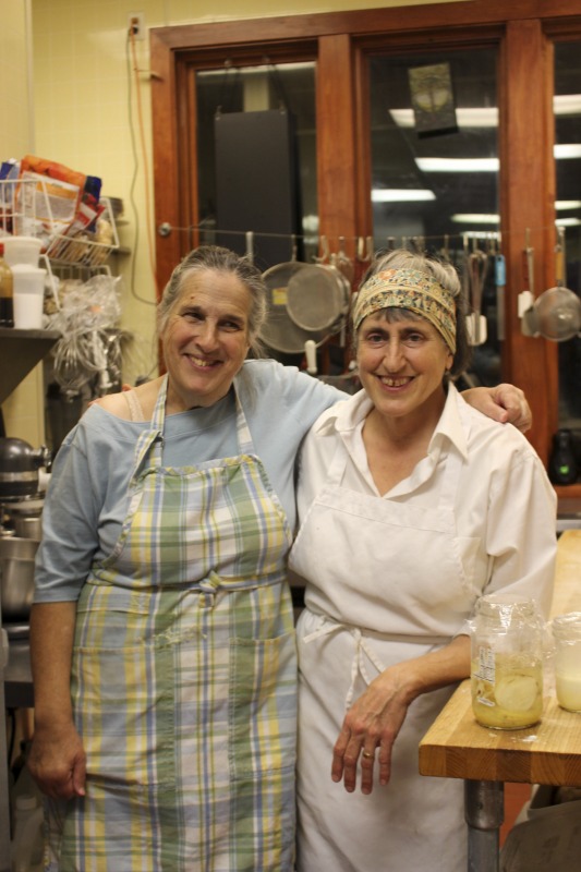 ["Master salt rising bread baker Genevieve (Jenny) Bardwell holds an A.S. in culinary arts from the Culinary Institute of America, and a B.S. and M.S. in plant pathology from the University of Massachusetts. Jenny is the co-author of Salt Rising Bread: Recipes and Heartfelt Stories of a Nearly Lost Appalachian Tradition and was the co-founder of Rising Creek Bakery in Mount Morris, Pennsylvania, both with Susan Ray Brown. Jenny has engaged in a deep, decades-long study of the unique labor-intensive Appalachian bread, focusing particularly on the scientific process and researching analog breads in other cultures. In 2017, she was awarded a Folk and Traditional Arts Apprenticeship Grant from the Pennsylvania Council of the Arts to lead a salt rising bread apprenticeship with baker Antonio Archer and in 2018, she was awarded an Folklife Apprenticeship Grant from the West Virginia Folklife Program with fellow baker Susan Ray Brown and apprentice Amy Dawson.Master salt rising bread baker Susan Ray Brown grew up in southern West Virginia, and her family roots go back nearly 300 years in her beloved Mountain State. She holds a B.A. in sociology/anthropology from West Virginia University. Susan is the co-author of Salt Rising Bread: Recipes and Heartfelt Stories of a Nearly Lost Appalachian Tradition and was the co-founder of Rising Creek Bakery in Mount Morris, PA, both with Jenny Bardwell. Susan has engaged in a deep, decades-long study of the unique labor-intensive Appalachian bread, recording oral histories, gathering recipes, conducting scientific studies, and constantly experimenting through her own baking. Find more on her website at www.saltrisingbread.net."]%