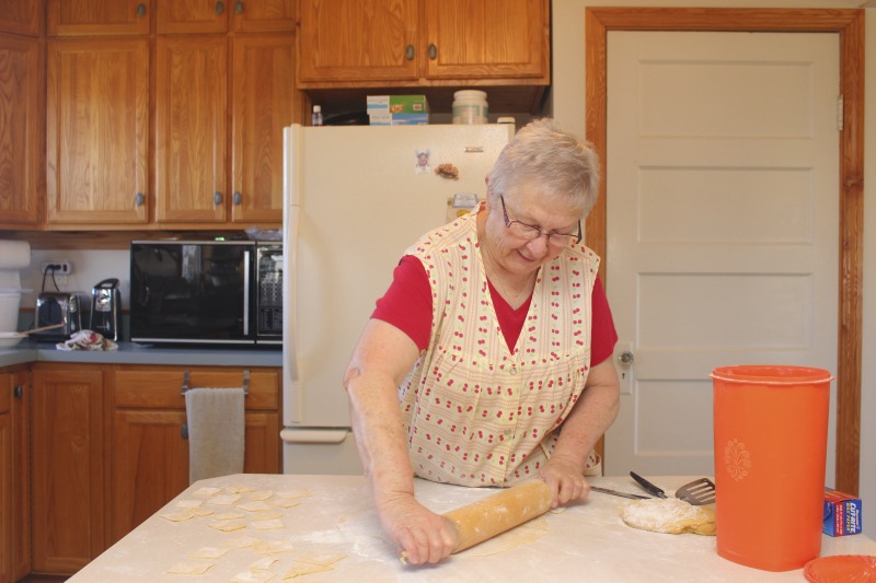 ["Eleanor Betler was born in Buckhannon, West Virginia in 1940 and raised in Cleveland, Ohio. She spent her summers in Helvetia at the farm of her maternal grandparents, James and Anna Merkli McNeal. She married Howard Bud Betler in 1961. The couple moved to a hilltop farm in Helvetia and raised four children. All the good cooks, many of them relatives of Mr. Betler taught Mrs. Betler about canning, preserving, cooking and baking. She was especially interested to learn the skills of butchering and preserving meat, and making sausage. Mrs. Betler loves the Swiss traditional baking but also Appalachian ways of some neighbors. She grinds her own flour for baking bread. At Fasnacht time she invites neighbors and friends to make the hozablatz and rosettes just to keep the tradition alive. She also preserves this history by collecting stories, music, and photographs for The Helvetia Archives.This interview is part of a series of interviews conducted with foodways practitioners in Helvetia, West Virginia, as part of the Helvetia Foodways Oral History Project in partnership with the Southern Foodways Alliance. Learn more: https://www.southernfoodways.org/oral-history/helvetia-west-virginia/"]%