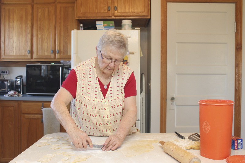 ["Eleanor Betler was born in Buckhannon, West Virginia in 1940 and raised in Cleveland, Ohio. She spent her summers in Helvetia at the farm of her maternal grandparents, James and Anna Merkli McNeal. She married Howard Bud Betler in 1961. The couple moved to a hilltop farm in Helvetia and raised four children. All the good cooks, many of them relatives of Mr. Betler taught Mrs. Betler about canning, preserving, cooking and baking. She was especially interested to learn the skills of butchering and preserving meat, and making sausage. Mrs. Betler loves the Swiss traditional baking but also Appalachian ways of some neighbors. She grinds her own flour for baking bread. At Fasnacht time she invites neighbors and friends to make the hozablatz and rosettes just to keep the tradition alive. She also preserves this history by collecting stories, music, and photographs for The Helvetia Archives.This interview is part of a series of interviews conducted with foodways practitioners in Helvetia, West Virginia, as part of the Helvetia Foodways Oral History Project in partnership with the Southern Foodways Alliance. Learn more: https://www.southernfoodways.org/oral-history/helvetia-west-virginia/"]%