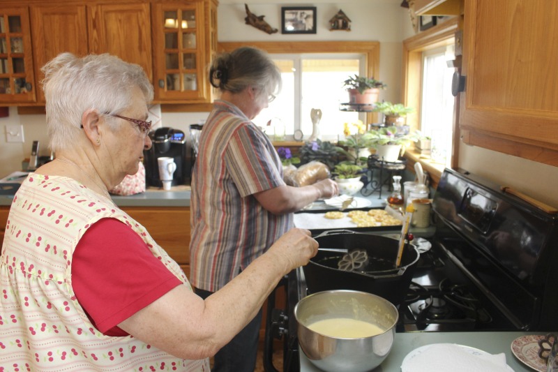 ["Eleanor Betler was born in Buckhannon, West Virginia in 1940 and raised in Cleveland, Ohio. She spent her summers in Helvetia at the farm of her maternal grandparents, James and Anna Merkli McNeal. She married Howard Bud Betler in 1961. The couple moved to a hilltop farm in Helvetia and raised four children. All the good cooks, many of them relatives of Mr. Betler taught Mrs. Betler about canning, preserving, cooking and baking. She was especially interested to learn the skills of butchering and preserving meat, and making sausage. Mrs. Betler loves the Swiss traditional baking but also Appalachian ways of some neighbors. She grinds her own flour for baking bread. At Fasnacht time she invites neighbors and friends to make the hozablatz and rosettes just to keep the tradition alive. She also preserves this history by collecting stories, music, and photographs for The Helvetia Archives.This interview is part of a series of interviews conducted with foodways practitioners in Helvetia, West Virginia, as part of the Helvetia Foodways Oral History Project in partnership with the Southern Foodways Alliance. Learn more: https://www.southernfoodways.org/oral-history/helvetia-west-virginia/"]%