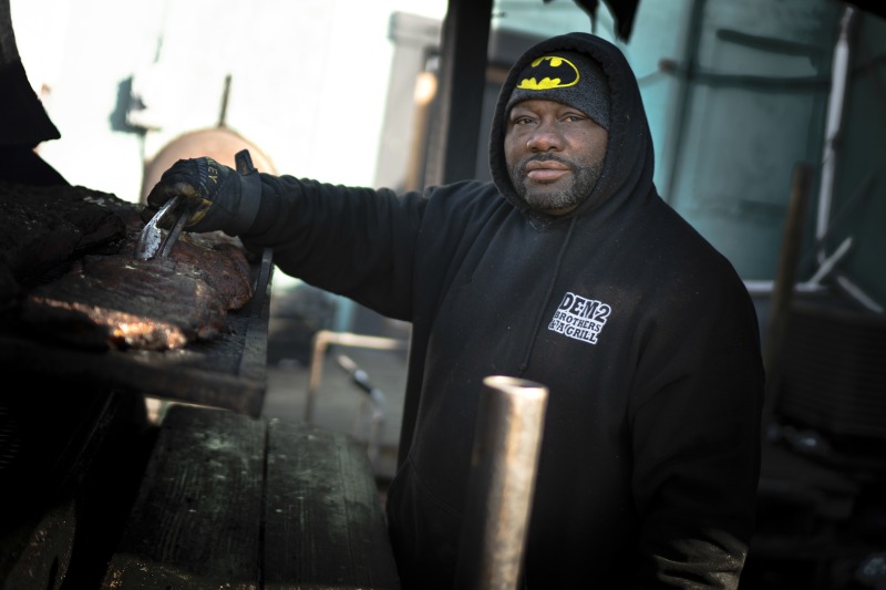 ["Ron Blanks is the grill master at Dem 2 Brothers and a Grill restaurant on Charleston's West Side. Blanks was photographed by producer Wendel Patrick as part of the Out of the Blocks podcasts two episodes on Charlestons West Side. Learn more: https://wvfolklife.org/2020/01/17/out-of-the-blocks-podcast-highlights-charlestons-west-side-west-virginia-folklife-hosts-listening-party-february-12/"]%