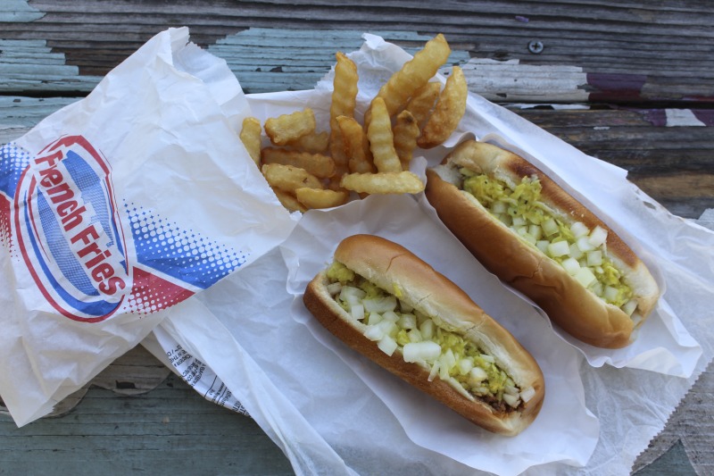 ["Chums Hot Dogs (8315 McCorkle Ave.) in Marmet serves a classic West Virginia dog (chili, slaw, mustard, and onions) with a micro-regional variant of slaw with yellow mustard, rather than mayonnaise, as the primary ingredient. A 2018 review of Chums on the West Virginia Hot Dog blog credits Donald Goat Kinder as the originator of the yellow slaw.This is part of a collection of materials documenting West Virginia hot dogs and hot dog joints. For more, see the West Virginia hot dog blog: http://wvhotdogblog.blogspot.com/And Emily Hilliards piece on West Virginia hot dogs for the Fall 2016 issue of the Southern Foodways Alliances journal Gravy: https://www.southernfoodways.org/slaw-abiding-citizens-a-quest-for-the-west-virginia-hot-dog/"]%