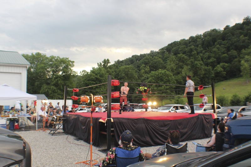 All Star Wrestling (ASW) is an independent wrestling promotion out of Madison, West Virginia, owned and operated by Gary Damron. Wrestlers on ASWs regular card include Rocky Rage (Rocky Hardin), Huffmanly (Kasey Huffman), and Shane Storm. On July 18, 2020, during the COVID-19 pandemic, Damron held ASWs first Drive-In Wrestling event at Lees Dance Studio in Winfield, WV. Fans circled the ring with their cars and sat in and on their cars and in bleachers to watch the matches.