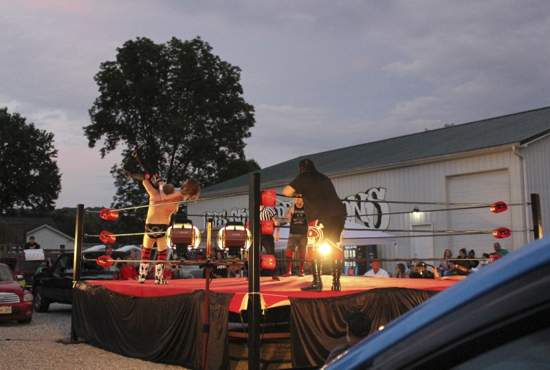 All Star Wrestling (ASW) is an independent wrestling promotion out of Madison, West Virginia, owned and operated by Gary Damron. Wrestlers on ASWs regular card include Rocky Rage (Rocky Hardin), Huffmanly (Kasey Huffman), and Shane Storm. On July 18, 2020, during the COVID-19 pandemic, Damron held ASWs first Drive-In Wrestling event at Lees Dance Studio in Winfield, WV. Fans circled the ring with their cars and sat in and on their cars and in bleachers to watch the matches.