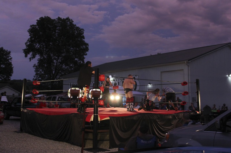 All Star Wrestling (ASW) is an independent wrestling promotion out of Madison, West Virginia, owned and operated by Gary Damron. Wrestlers on ASWs regular card include Rocky Rage (Rocky Hardin), Huffmanly (Kasey Huffman), and Shane Storm. On July 18, 2020, during the COVID-19 pandemic, Damron held ASWs first Drive-In Wrestling event at Lees Dance Studio in Winfield, WV. Fans circled the ring with their cars and sat in and on their cars and in bleachers to watch the matches.