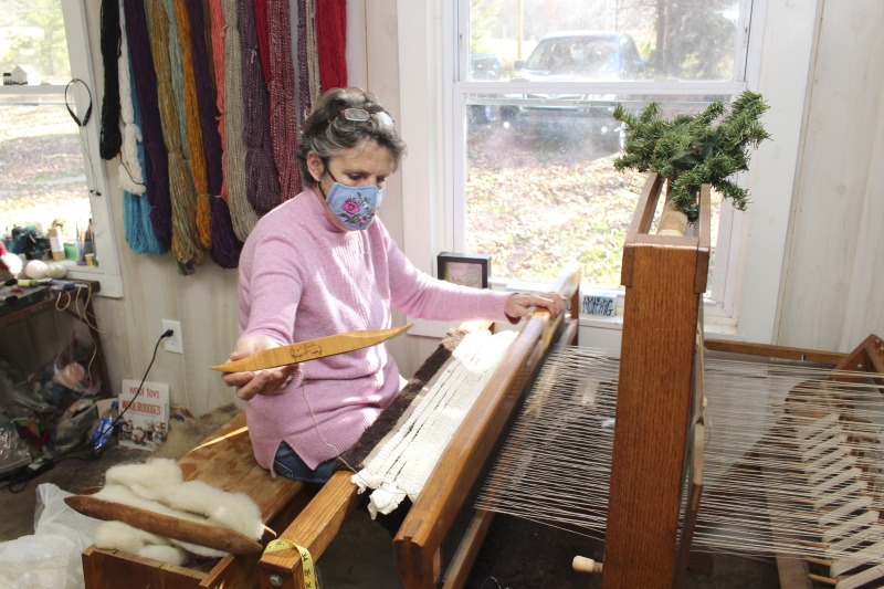 ["Kathy Evans (b. July 8, 1962, Morgantown, WV) of Bruceton Mills and Margaret Bruning of Elkins are participants in the 2020-2021 West Virginia Folklife Apprenticeship Program, in an apprenticeship titled, Sheep to Shawl: The Art of Raising Sheep and Creating Fiber Arts. Evans is a fifth-generation farmer and co-owner with her husband Reid of Evans Knob Farm in Preston County where she cultivates Certified Naturally Grown vegetables and raises sheep and poultry. She teaches and exhibits her fiber arts both in West Virginia and across the country and has been featured in Modern Farmer and Morgantown Magazine. Bruning grew up on a goat farm in upstate New York and has been a lifelong fiber artist. She and her husband David raise sheep at their homestead in Randolph County.Read a profile of Evans and Bruning on the West Virginia Folklife blog:https://wvfolklife.org/2020/11/04/2020-folklife-apprenticeship-feature-kathy-evans-margaret-bruning-sheep-to-shawl/Evans Knob Farm website: https://www.evansknobfarm.com/Poe Run Craft and Provisions: http://www.poerun.org/"]%