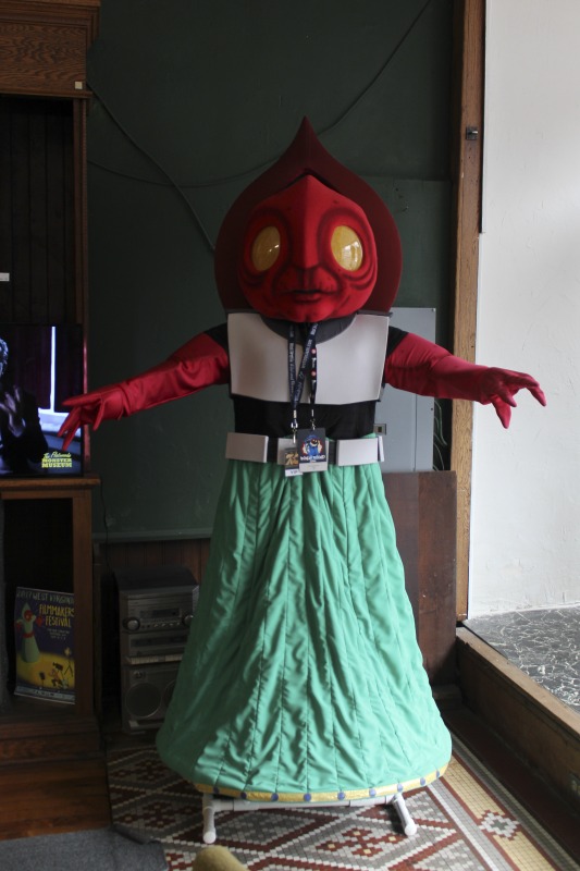 The Flatwoods Monster Museum, which also serves as the Braxton County Visitors Center, is located in downtown Sutton in Braxton County, West Virginia. The Museum displays ephemera, folk art, videos, and souvenirs related to the legend of the Flatwoods Monster, which was first sighted in Flatwoods, West Virginia on September 12, 1952 by Kathleen May, Eugene Lemon, Teddy May, Ronald Shaver, Neal Nunley, Teddy Neal, and Tommy Hyer. West Virginia Humanities Council Executive Director Eric Waggoner and State Folklorist Emily Hilliard visited the museum and met with Andrew Smith, Executive Director of the Braxton County CVB and Flatwoods Monster Museum, on January 30, 2020.Visit the Flatwoods Museum website here: https://braxtonwv.org/the-flatwoods-monster/visit-the-museum/For more on the legend of the Flatwoods Monster, visit e-WV: https://www.wvencyclopedia.org/articles/2192