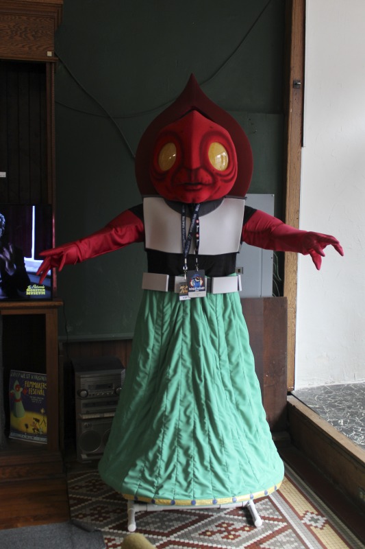 ["The Flatwoods Monster Museum, which also serves as the Braxton County Visitors Center, is located in downtown Sutton in Braxton County, West Virginia. The Museum displays ephemera, folk art, videos, and souvenirs related to the legend of the Flatwoods Monster, which was first sighted in Flatwoods, West Virginia on September 12, 1952 by Kathleen May, Eugene Lemon, Teddy May, Ronald Shaver, Neal Nunley, Teddy Neal, and Tommy Hyer. West Virginia Humanities Council Executive Director Eric Waggoner and State Folklorist Emily Hilliard visited the museum and met with Andrew Smith, Executive Director of the Braxton County CVB and Flatwoods Monster Museum, on January 30, 2020.Visit the Flatwoods Museum website here: https://braxtonwv.org/the-flatwoods-monster/visit-the-museum/For more on the legend of the Flatwoods Monster, visit e-WV: https://www.wvencyclopedia.org/articles/2192"]%