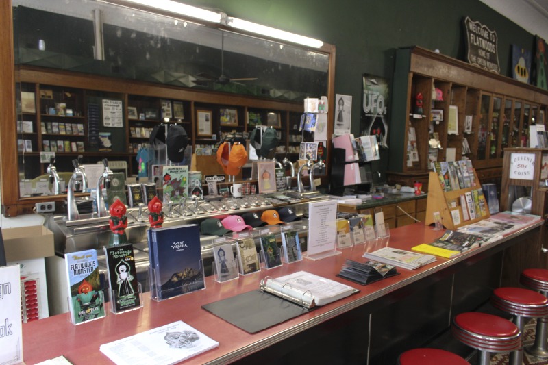 ["The Flatwoods Monster Museum, which also serves as the Braxton County Visitors Center, is located in downtown Sutton in Braxton County, West Virginia. The Museum displays ephemera, folk art, videos, and souvenirs related to the legend of the Flatwoods Monster, which was first sighted in Flatwoods, West Virginia on September 12, 1952 by Kathleen May, Eugene Lemon, Teddy May, Ronald Shaver, Neal Nunley, Teddy Neal, and Tommy Hyer. West Virginia Humanities Council Executive Director Eric Waggoner and State Folklorist Emily Hilliard visited the museum and met with Andrew Smith, Executive Director of the Braxton County CVB and Flatwoods Monster Museum, on January 30, 2020.Visit the Flatwoods Museum website here: https://braxtonwv.org/the-flatwoods-monster/visit-the-museum/For more on the legend of the Flatwoods Monster, visit e-WV: https://www.wvencyclopedia.org/articles/2192"]%