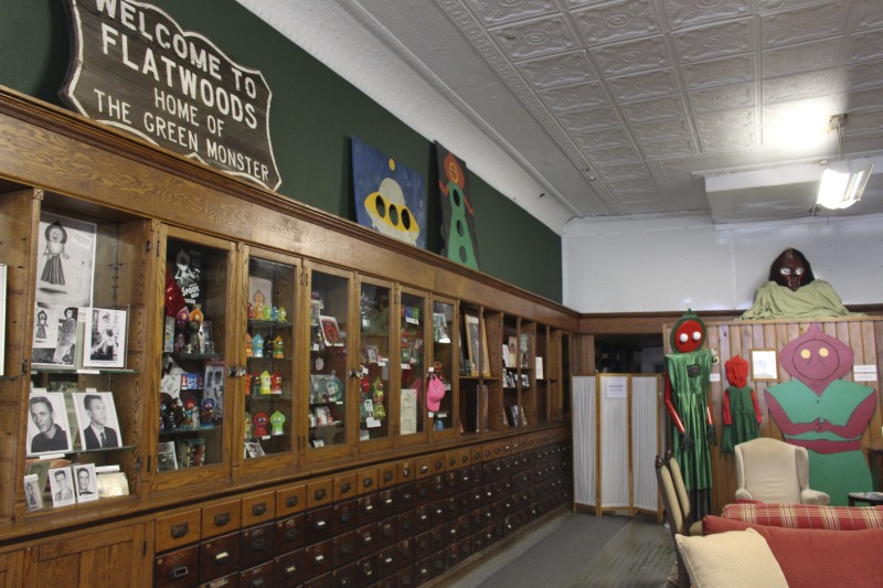 The Flatwoods Monster Museum, which also serves as the Braxton County Visitors Center, is located in downtown Sutton in Braxton County, West Virginia. The Museum displays ephemera, folk art, videos, and souvenirs related to the legend of the Flatwoods Monster, which was first sighted in Flatwoods, West Virginia on September 12, 1952 by Kathleen May, Eugene Lemon, Teddy May, Ronald Shaver, Neal Nunley, Teddy Neal, and Tommy Hyer. West Virginia Humanities Council Executive Director Eric Waggoner and State Folklorist Emily Hilliard visited the museum and met with Andrew Smith, Executive Director of the Braxton County CVB and Flatwoods Monster Museum, on January 30, 2020.Visit the Flatwoods Museum website here: https://braxtonwv.org/the-flatwoods-monster/visit-the-museum/For more on the legend of the Flatwoods Monster, visit e-WV: https://www.wvencyclopedia.org/articles/2192