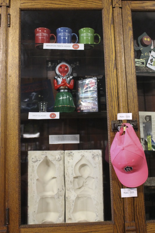 The Flatwoods Monster Museum, which also serves as the Braxton County Visitors Center, is located in downtown Sutton in Braxton County, West Virginia. The Museum displays ephemera, folk art, videos, and souvenirs related to the legend of the Flatwoods Monster, which was first sighted in Flatwoods, West Virginia on September 12, 1952 by Kathleen May, Eugene Lemon, Teddy May, Ronald Shaver, Neal Nunley, Teddy Neal, and Tommy Hyer. West Virginia Humanities Council Executive Director Eric Waggoner and State Folklorist Emily Hilliard visited the museum and met with Andrew Smith, Executive Director of the Braxton County CVB and Flatwoods Monster Museum, on January 30, 2020.Visit the Flatwoods Museum website here: https://braxtonwv.org/the-flatwoods-monster/visit-the-museum/For more on the legend of the Flatwoods Monster, visit e-WV: https://www.wvencyclopedia.org/articles/2192