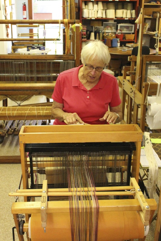 ["Sarah Fletcher (b. Canaan Valley) is a weaver, retired nurse, and the owner of Bens Old Loom Barn in Davis, WV. She is the daughter of Barbra Dorothy Mayor Thompson (August 5, 1920-October 1, 2008), a weaver and National Heritage Fellow who learned to weave at the Arthurdale Homestead. Learn more about Bens Old Loom Barn: https://www.facebook.com/bensoldloombarn/"]%