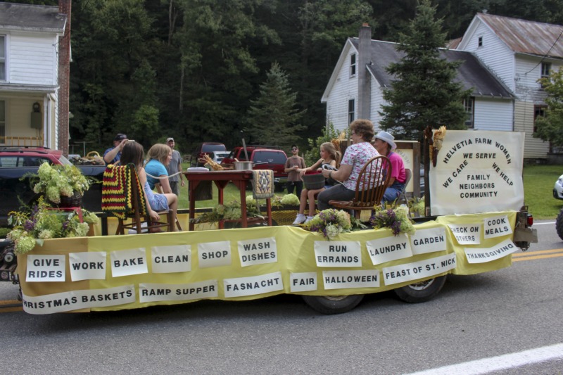 ["The Helvetia Community Fair, located in the Swiss community of Helvetia in Randolph County, is one of the oldest agricultural fairs in West Virginia. Activities include a parade in Swiss costume, alphorn music, Swiss folk dancing and singing, fahnenschwingen (flag twirling), a crafts, food, and canning exhibition, field events, an archery shoot, and more.Learn more in Emily Hilliard's Bitter Southerner piece on Helvetia's seasonal celebrations, including the Community Fair: https://bittersoutherner.com/my-year-in-helvetia-west-virginiaAnd in the Helvetia Foodways Oral History Project conducted by the West Virginia Folklife Program in partnership with the Southern Foodways Alliance: https://www.southernfoodways.org/oral-history/helvetia-west-virginia/"]%