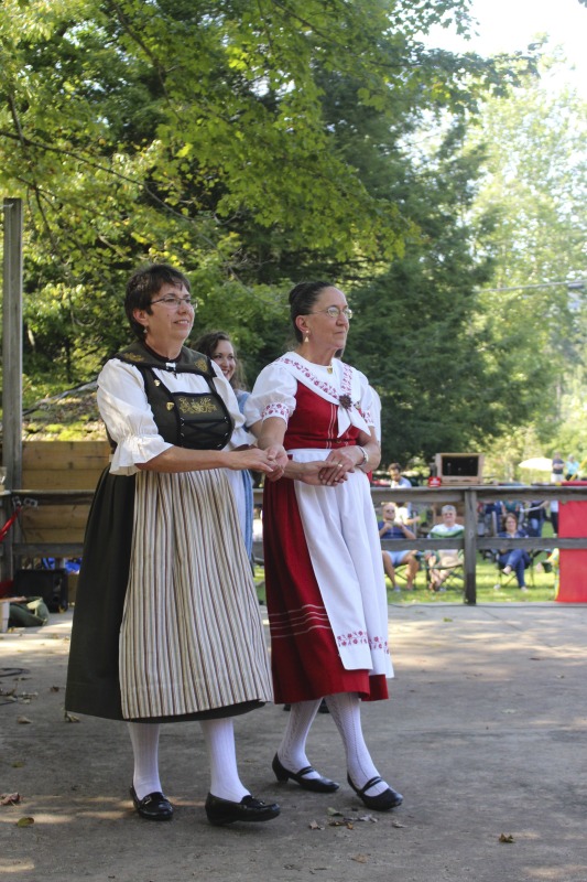 ["The Helvetia Community Fair, located in the Swiss community of Helvetia in Randolph County, is one of the oldest agricultural fairs in West Virginia. Activities include a parade in Swiss costume, alphorn music, Swiss folk dancing and singing, fahnenschwingen (flag twirling), a crafts, food, and canning exhibition, field events, an archery shoot, and more.Learn more in Emily Hilliard's Bitter Southerner piece on Helvetia's seasonal celebrations, including the Community Fair: https://bittersoutherner.com/my-year-in-helvetia-west-virginiaAnd in the Helvetia Foodways Oral History Project conducted by the West Virginia Folklife Program in partnership with the Southern Foodways Alliance: https://www.southernfoodways.org/oral-history/helvetia-west-virginia/"]%