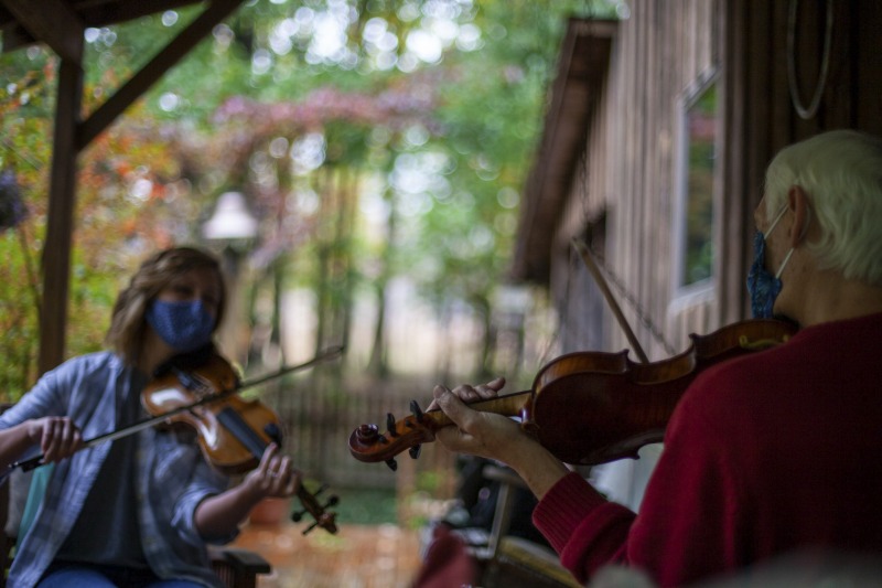 ["Joe Herrman (master artist, b. 1949)  of Paw Paw in Hampshire County and Dakota Karper (apprentice, b. 1992) of Capon Bridge are participants in the 2020-2021 West Virginia Folklife Apprenticeship Program, studying old-time fiddle. Herrmann is a founding member of the Critton Hollow String Band and has taught old-time fiddle to many private students and at the Augusta Heritage Center. Dakota Karper, a Hampshire County native, has been playing old-time fiddle for 20 years and runs The Cat and the Fiddle Music School. Herrmann and Karper apprenticed together previously in 2004 (when Karper was 11) through Augusta Heritage Centers former Apprenticeship Program.See the West Virginia Folklife Program feature on Herrmann and Karper: https://wvfolklife.org/2020/12/03/2020-folklife-apprenticeship-feature-joe-herrmann-dakota-karper-old-time-fiddle/"]%