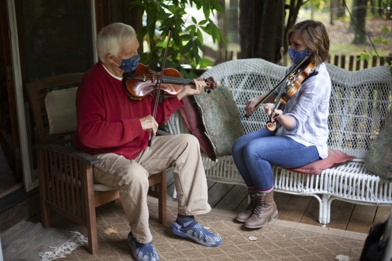 ["Joe Herrman (master artist, b. 1949)  of Paw Paw in Hampshire County and Dakota Karper (apprentice, b. 1992) of Capon Bridge are participants in the 2020-2021 West Virginia Folklife Apprenticeship Program, studying old-time fiddle. Herrmann is a founding member of the Critton Hollow String Band and has taught old-time fiddle to many private students and at the Augusta Heritage Center. Dakota Karper, a Hampshire County native, has been playing old-time fiddle for 20 years and runs The Cat and the Fiddle Music School. Herrmann and Karper apprenticed together previously in 2004 (when Karper was 11) through Augusta Heritage Centers former Apprenticeship Program.See the West Virginia Folklife Program feature on Herrmann and Karper: https://wvfolklife.org/2020/12/03/2020-folklife-apprenticeship-feature-joe-herrmann-dakota-karper-old-time-fiddle/"]%