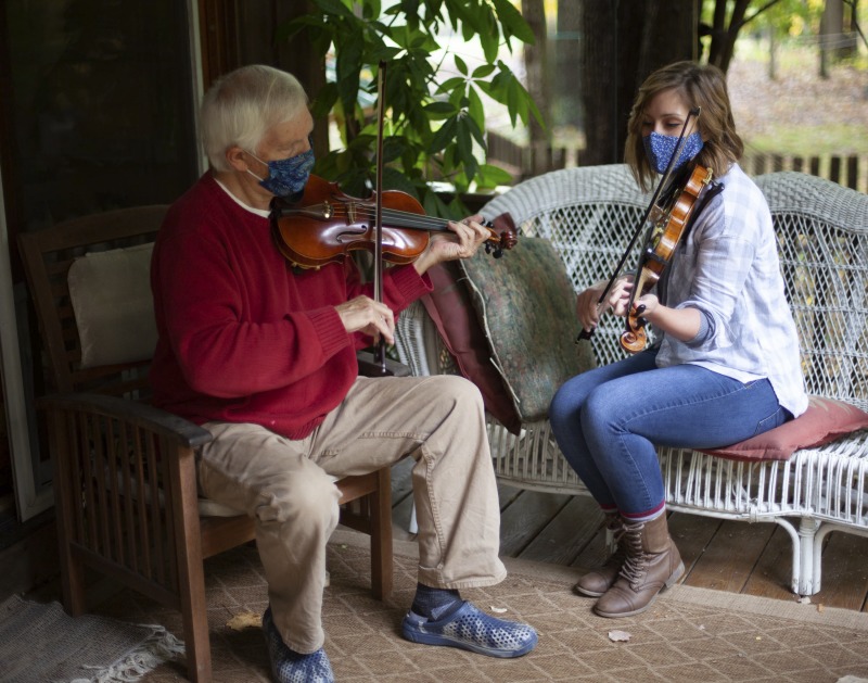 Joe Herrman (master artist, b. 1949)  of Paw Paw in Hampshire County and Dakota Karper (apprentice, b. 1992) of Capon Bridge are participants in the 2020-2021 West Virginia Folklife Apprenticeship Program, studying old-time fiddle. Herrmann is a founding member of the Critton Hollow String Band and has taught old-time fiddle to many private students and at the Augusta Heritage Center. Dakota Karper, a Hampshire County native, has been playing old-time fiddle for 20 years and runs The Cat and the Fiddle Music School. Herrmann and Karper apprenticed together previously in 2004 (when Karper was 11) through Augusta Heritage Centers former Apprenticeship Program.See the West Virginia Folklife Program feature on Herrmann and Karper: https://wvfolklife.org/2020/12/03/2020-folklife-apprenticeship-feature-joe-herrmann-dakota-karper-old-time-fiddle/
