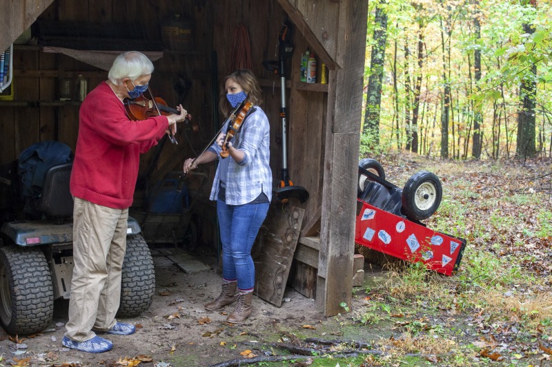 ["Joe Herrman (master artist, b. 1949)  of Paw Paw in Hampshire County and Dakota Karper (apprentice, b. 1992) of Capon Bridge are participants in the 2020-2021 West Virginia Folklife Apprenticeship Program, studying old-time fiddle. Herrmann is a founding member of the Critton Hollow String Band and has taught old-time fiddle to many private students and at the Augusta Heritage Center. Dakota Karper, a Hampshire County native, has been playing old-time fiddle for 20 years and runs The Cat and the Fiddle Music School. Herrmann and Karper apprenticed together previously in 2004 (when Karper was 11) through Augusta Heritage Centers former Apprenticeship Program.See the West Virginia Folklife Program feature on Herrmann and Karper: https://wvfolklife.org/2020/12/03/2020-folklife-apprenticeship-feature-joe-herrmann-dakota-karper-old-time-fiddle/"]%