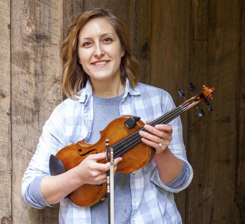 ["Joe Herrman (master artist, b. 1949)  of Paw Paw in Hampshire County and Dakota Karper (apprentice, b. 1992) of Capon Bridge are participants in the 2020-2021 West Virginia Folklife Apprenticeship Program, studying old-time fiddle. Herrmann is a founding member of the Critton Hollow String Band and has taught old-time fiddle to many private students and at the Augusta Heritage Center. Dakota Karper, a Hampshire County native, has been playing old-time fiddle for 20 years and runs The Cat and the Fiddle Music School. Herrmann and Karper apprenticed together previously in 2004 (when Karper was 11) through Augusta Heritage Centers former Apprenticeship Program.See the West Virginia Folklife Program feature on Herrmann and Karper: https://wvfolklife.org/2020/12/03/2020-folklife-apprenticeship-feature-joe-herrmann-dakota-karper-old-time-fiddle/"]%