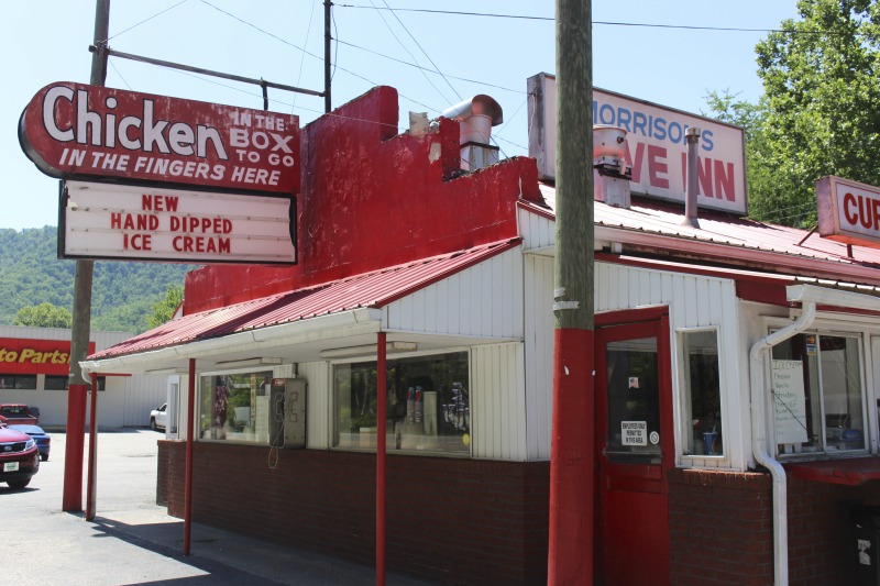 ["Morrison's Drive-In is located at 126 Stollings Ave., along the Guyandotte River in Logan, West Virginia. For more information visit: https://www.facebook.com/Morrisons-Drive-Inn-Offical-Site-114921678593024/This is part of a collection of materials documenting West Virginia hot dogs and hot dog joints. For more, see the West Virginia hot dog blog: http://wvhotdogblog.blogspot.com/ and Emily Hilliard's piece, \"Slaw Abiding Citizens: A Quest for the West Virginia Hot Dog\" published in the Southern Foodways Alliance's journal Gravy. https://www.southernfoodways.org/slaw-abiding-citizens-a-quest-for-the-west-virginia-hot-dog/"]%