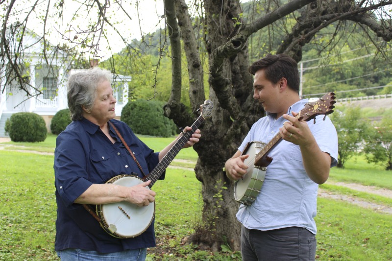 ["Kim Johnson and Cody Jordan were participants in the 2020-2021 West Virginia Folklife Apprenticeship Program. Kim Johnson, a resident of South Charleston led an apprenticeship in banjo traditions of central West Virginia with apprentice Cody Jordan of Charleston. Johnson began playing with fiddler Wilson Douglas in 1979 and has played with and learned from many acclaimed West Virginia old-time musicians including Frank George and Lester McCumbers. She has taught both locally and nationally, at Augusta Heritage Center, Allegheny Echoes, The Festival of American Fiddle Tunes, and the Berkeley Old-time Music Convention. Jordan plays guitar in The Modock Rounders with Johnson, touring across the state and region, and is looking forward to expanding his knowledge of central West Virginia old-time banjo traditions.See our feature on Johnsons apprenticeship with Jordan here: https://wvfolklife.org/2020/09/04/2020-folklife-apprenticeship-feature-kim-johnson-cody-jordan-banjo-traditions-of-central-west-virginia/The West Virginia Folklife Apprenticeship Program offers up to a $3,000 stipend to West Virginia master traditional artists or tradition bearers working with qualified apprentices on a year-long in-depth apprenticeship in their cultural expression or traditional art form. These apprenticeships aim to facilitate the transmission of techniques and artistry of the forms, as well as their histories and traditions.The apprenticeship program grants are administered by the West Virginia Folklife Program at the West Virginia Humanities Council in Charleston and are supported in part by an Art Works grant from the National Endowment for the Arts. West Virginia Folklife is dedicated to the documentation, preservation, presentation, and support of West Virginias vibrant cultural heritage and living traditions."]%