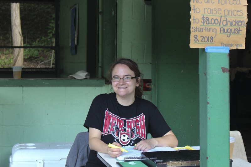 Weirton native Molly Kopa, 26, works at the Wednesday Chicken Blasts at the Serbian Picnic Grounds in Weirton in the summer time. She started working there when she was 13, with her grandfather Chicken George (George Zatezalo). See the short video and audio documentary about the Chicken Blasts, produced by the West Virginia Folklife Program and West Virginia Public Broadcasting: https://wvfolklife.org/2020/01/27/weirtons-serbian-heritage-is-a-chicken-blast/https://www.youtube.com/watch?v=XpGF-MFUlhYhttps://soundcloud.com/wvpublicnews/weirtons-serbian-heritage-is-a-chicken-blast