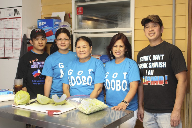 ["Daniel and Ellen Lubuguin are the owners of Philippines Best Food in Parkersburg, WV. Daniel works as the chef and Ellen also owns and operates a salon next door. The Lubuguins are originally from the Philippines and have been living in West Virginia for over 20 years. See Emily Hilliard's columbn about the Lubuguins and Philippines Best Food in the Summer 2017 issue of Goldenseal magazine and online here: https://wvfolklife.org/2017/07/13/the-state-folklorists-notebook-adventures-menu-sharing-traditional-filipino-food-in-parkersburg/"]%