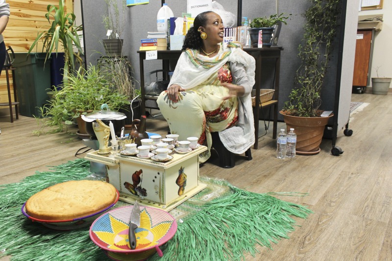 On February 25, 2020, Amy Loughs (b. 1975, Murray, Kentucky) Hardy County ESOL class in Moorefield hosted an Ethiopian/Eritrean coffee ceremony and potluck. Students, who are of Haitian, Burmese, Eritrean, Ethiopian, and Puerto Rican dissent brought in food dishes from their respective cultural traditions, to share with the class and state folklorist Emily Hilliard. The majority of the ESOL students work at Pilgrims Pride chicken plant in Moorefield. Dishes students brought to class include Mohinga, a Burmese soup with chili; a Burmese tea leaf salad; and Yuzana, a Burmese pickled tea; Ethiopian Doro Wat; Puerto Rican bread pudding; Haitian fried pork with gratin; and Himbasha, an Ethiopian bread with black sesame seeds or black cumin.