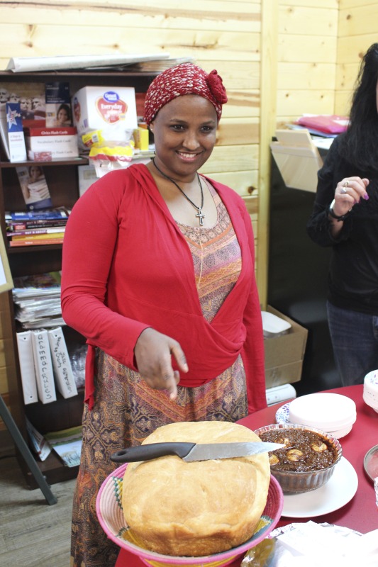 ["On February 25, 2020, Amy Loughs (b. 1975, Murray, Kentucky) Hardy County ESOL class in Moorefield hosted an Ethiopian/Eritrean coffee ceremony and potluck. Students, who are of Haitian, Burmese, Eritrean, Ethiopian, and Puerto Rican dissent brought in food dishes from their respective cultural traditions, to share with the class and state folklorist Emily Hilliard. The majority of the ESOL students work at Pilgrims Pride chicken plant in Moorefield. Dishes students brought to class include Mohinga, a Burmese soup with chili; a Burmese tea leaf salad; and Yuzana, a Burmese pickled tea; Ethiopian Doro Wat; Puerto Rican bread pudding; Haitian fried pork with gratin; and Himbasha, an Ethiopian bread with black sesame seeds or black cumin."]%