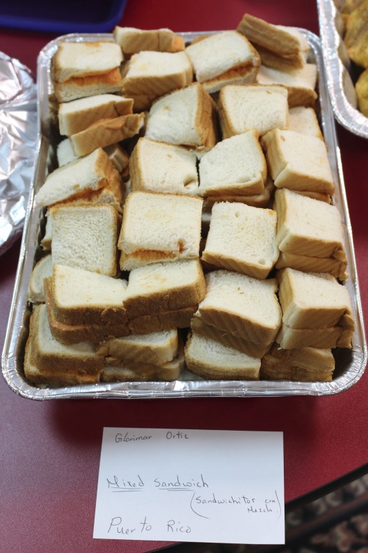 On February 25, 2020, Amy Loughs (b. 1975, Murray, Kentucky) Hardy County ESOL class in Moorefield hosted an Ethiopian/Eritrean coffee ceremony and potluck. Students, who are of Haitian, Burmese, Eritrean, Ethiopian, and Puerto Rican dissent brought in food dishes from their respective cultural traditions, to share with the class and state folklorist Emily Hilliard. The majority of the ESOL students work at Pilgrims Pride chicken plant in Moorefield. Dishes students brought to class include Mohinga, a Burmese soup with chili; a Burmese tea leaf salad; and Yuzana, a Burmese pickled tea; Ethiopian Doro Wat; Puerto Rican bread pudding; Haitian fried pork with gratin; and Himbasha, an Ethiopian bread with black sesame seeds or black cumin.