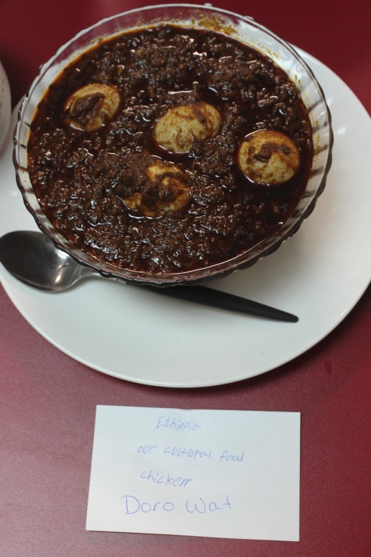 ["On February 25, 2020, Amy Loughs (b. 1975, Murray, Kentucky) Hardy County ESOL class in Moorefield hosted an Ethiopian/Eritrean coffee ceremony and potluck. Students, who are of Haitian, Burmese, Eritrean, Ethiopian, and Puerto Rican dissent brought in food dishes from their respective cultural traditions, to share with the class and state folklorist Emily Hilliard. The majority of the ESOL students work at Pilgrims Pride chicken plant in Moorefield. Dishes students brought to class include Mohinga, a Burmese soup with chili; a Burmese tea leaf salad; and Yuzana, a Burmese pickled tea; Ethiopian Doro Wat; Puerto Rican bread pudding; Haitian fried pork with gratin; and Himbasha, an Ethiopian bread with black sesame seeds or black cumin."]%