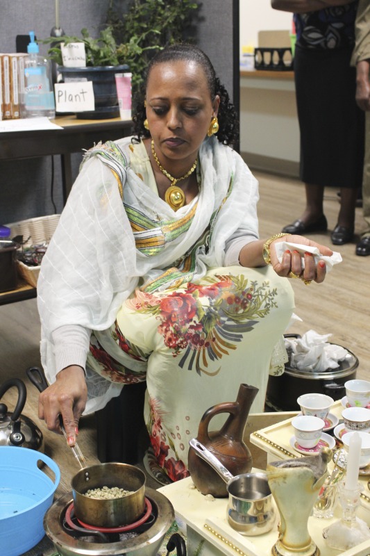 ["On February 25, 2020, Amy Loughs (b. 1975, Murray, Kentucky) Hardy County ESOL class in Moorefield hosted an Ethiopian/Eritrean coffee ceremony and potluck. Students, who are of Haitian, Burmese, Eritrean, Ethiopian, and Puerto Rican dissent brought in food dishes from their respective cultural traditions, to share with the class and state folklorist Emily Hilliard. The majority of the ESOL students work at Pilgrims Pride chicken plant in Moorefield. Dishes students brought to class include Mohinga, a Burmese soup with chili; a Burmese tea leaf salad; and Yuzana, a Burmese pickled tea; Ethiopian Doro Wat; Puerto Rican bread pudding; Haitian fried pork with gratin; and Himbasha, an Ethiopian bread with black sesame seeds or black cumin."]%