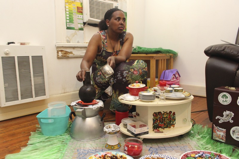 ["These photos were taken of a traditional Eritrean/Ethiopian coffee ceremony hosted by Trihas and her family at their home in Moorefield, West Virginia on June 26, 2021. Trihas and her family are immigrants from Eritrea and work at Pilgrims Pride chicken plant in Moorefield. Trihas friends and coworkers, Azeb and Kelem, who are Ethiopian immigrants, as well as Hardy County ESOL teacher Amy Lough were also guests at the ceremony. Inside Appalachia Folkways producer Clara Haizlett and West Virginia state folklorist Emily Hilliard are working on a radio piece about the coffee ceremony for West Virginia Public Broadcasting."]%