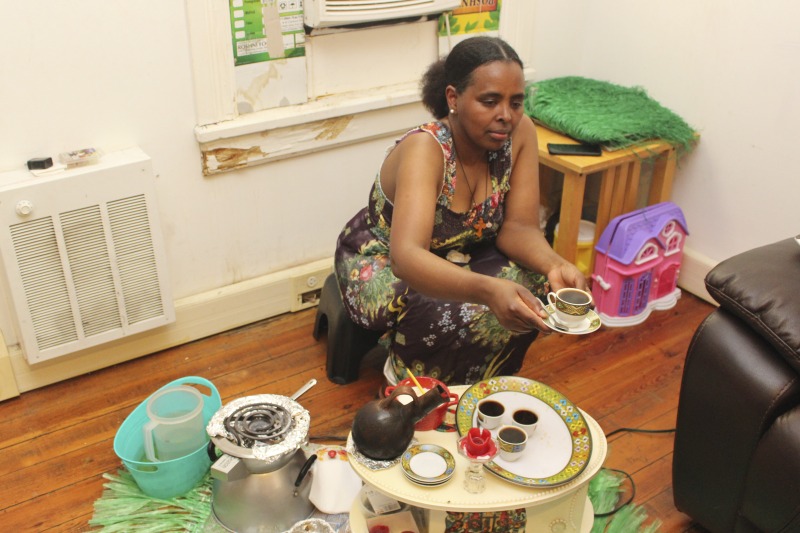 ["These photos were taken of a traditional Eritrean/Ethiopian coffee ceremony hosted by Trihas and her family at their home in Moorefield, West Virginia on June 26, 2021. Trihas and her family are immigrants from Eritrea and work at Pilgrims Pride chicken plant in Moorefield. Trihas friends and coworkers, Azeb and Kelem, who are Ethiopian immigrants, as well as Hardy County ESOL teacher Amy Lough were also guests at the ceremony. Inside Appalachia Folkways producer Clara Haizlett and West Virginia state folklorist Emily Hilliard are working on a radio piece about the coffee ceremony for West Virginia Public Broadcasting."]%