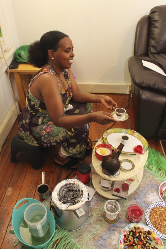 ["These photos were taken of a traditional Eritrean/Ethiopian coffee ceremony hosted by Trihas and her family at their home in Moorefield, West Virginia on June 26, 2021. Trihas and her family are immigrants from Eritrea and work at Pilgrims Pride chicken plant in Moorefield. Trihas friends and coworkers, Azeb and Kelem, who are Ethiopian immigrants, as well as Hardy County ESOL teacher Amy Lough were also guests at the ceremony. Inside Appalachia Folkways producer Clara Haizlett and West Virginia state folklorist Emily Hilliard are working on a radio piece about the coffee ceremony for West Virginia Public Broadcasting."]%