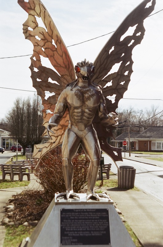 ["The Mothman Museum in Point Pleasant, West Virginia, was founded in 2005 by Jeff Wamsley (b. 1961, Point Pleasant, WV). Growing up, Wamsley lived next door to the Scarberrys, two of the primary initial Mothman witnesses. The Museum contains ephemera related to the Mothman legend, including props from the 2002 film, The Mothman Prophesies, copies of the police accounts of the initial Mothman witnesses, Mothman folk art, and more. Visit the Mothman Museum website: https://www.mothmanmuseum.com/Learn more about the Mothman legend via e-WV: https://www.wvencyclopedia.org/articles/1418"]%