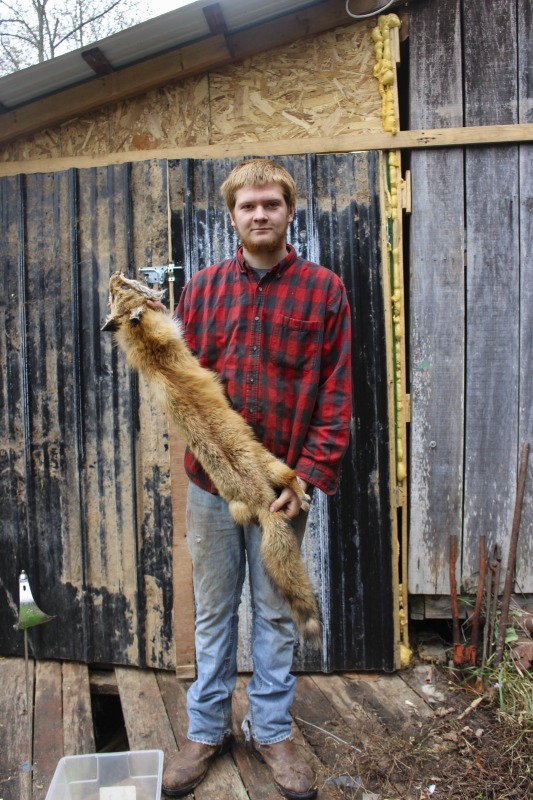 ["Aaron Parsons, 20 years old at the time of this photo, is a native of Jackson County, WV. He makes turkey calls with materials (slate, native woods, bone, etc.) found on his familys land in Jackson County. He is also a hunter, trapper, fisher, and hide tanner."]%