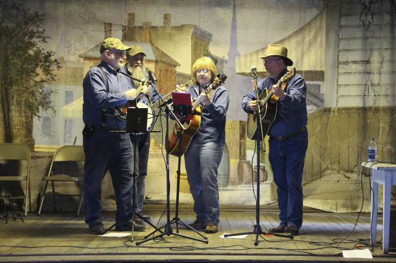 ["The Opossum Hollow String Band is composed of guitarists Keith Long and Martha Cordray, mandolin player Joe Cordray, and banjo player Jimmy Robbins.Learn more about the Pickens Maple Syrup Festival here: http://pickenswv.squarespace.com/maple-syrup-festival/"]%