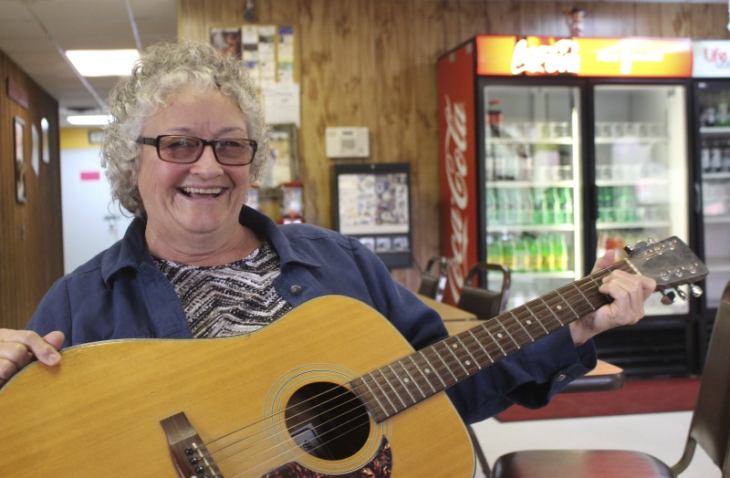 ["Elaine (Moore) Purkey was an activist songwriter and musician from Harts Creek, West Virginia in Lincoln County. She was born in 1949, on the same piece of property where she lived when she died in 2020. She was raised in a family of musicians and flatfoot dancers and attributed her powerful voice to the acapella singing she learned as a member of the Church of Christ. As a teenager she played in bands with her brother, and in early adulthood she was the lead singer of a local country band. In the 1980s, she began performing regularly on the Wallace Horn Friendly Neighbors Show, a live radio program out of Logan County that has been on the air since 1967. She eventually became the host of the show. Read state folklorist Emily Hilliard's tribute to Purkey: https://wvfolklife.org/2020/09/03/a-tribute-to-west-virginia-labor-singer-songwriter-elaine-purkey-1949-2020/"]%