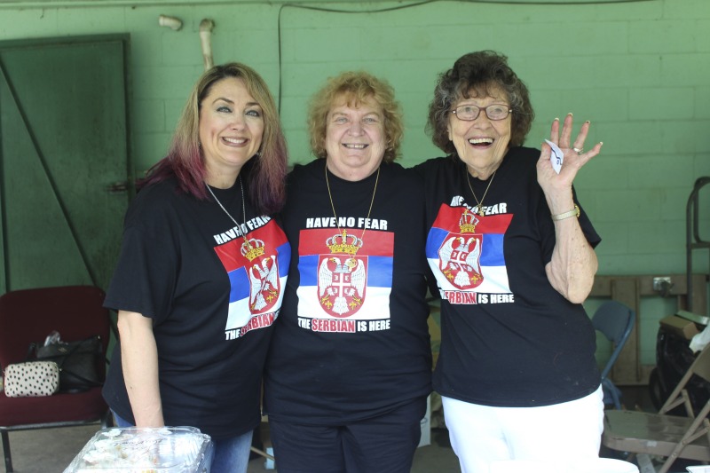 ["Every July, the Mens Club of the Steubenville, Ohio Holy Resurrection Serbian Orthodox Church hosts an annual picnic at their picnic grounds along Kings Creek in Weirton, West Virginia. The event serves as both a fundraiser for the Mens Club and a homecoming for Weirton and Steubenvilles Serbian Community. The event features Serbian music, dance, food, and drink. Mens Club members roast chickens and lambs on spits over open wood fires and sell them to picnic attendees. The spits were constructed out of material from Weirton Steel by Mens Club members and Weirton Steel employees in the 1960s. Other food served at the picnic includes pogacha (a type of Serbian bread), haluski or cabbage and noodles, cevaps (a pork, lamb, and beef sausage), strudel, nut rolls, beer, and Slivovitz.In 2017, state folklorist Emily Hilliard attended the Serbian picnic with Brynn Kusic, whose fathers family is part of the Weirton Serbian community. Learn more about the Annual Picnic via the Holy Resurrection Serbian Orthodox Church: https://www.hrsoc-steubenville.org/annual-picnicSee the short video and audio documentary about the Chicken Blasts, produced by the West Virginia Folklife Program and West Virginia Public Broadcasting: https://wvfolklife.org/2020/01/27/weirtons-serbian-heritage-is-a-chicken-blast/ https://www.youtube.com/watch?v=XpGF-MFUlhYhttps://soundcloud.com/wvpublicnews/weirtons-serbian-heritage-is-a-chicken-blast"]%