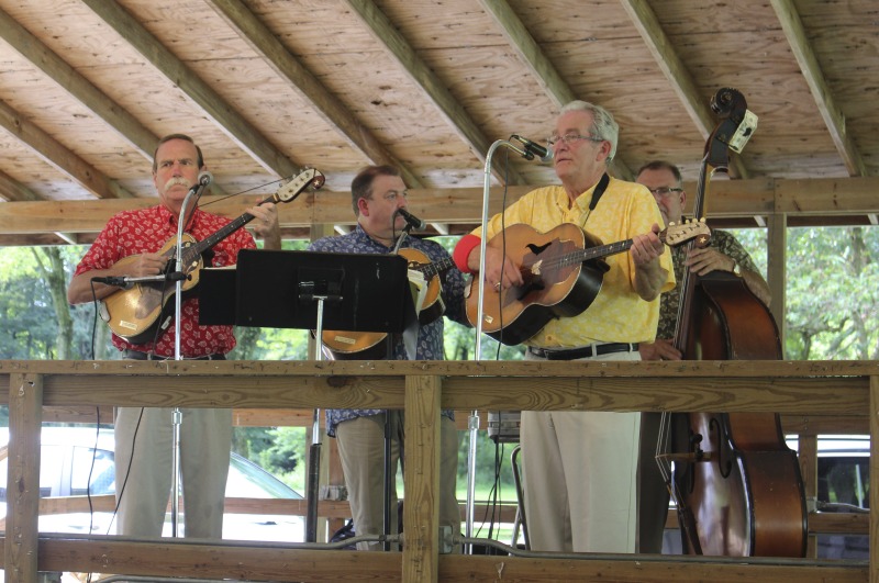 ["Every July, the Mens Club of the Steubenville, Ohio Holy Resurrection Serbian Orthodox Church hosts an annual picnic at their picnic grounds along Kings Creek in Weirton, West Virginia. The event serves as both a fundraiser for the Mens Club and a homecoming for Weirton and Steubenvilles Serbian Community. The event features Serbian music, dance, food, and drink. Mens Club members roast chickens and lambs on spits over open wood fires and sell them to picnic attendees. The spits were constructed out of material from Weirton Steel by Mens Club members and Weirton Steel employees in the 1960s. Other food served at the picnic includes pogacha (a type of Serbian bread), haluski or cabbage and noodles, cevaps (a pork, lamb, and beef sausage), strudel, nut rolls, beer, and Slivovitz.In 2017, state folklorist Emily Hilliard attended the Serbian picnic with Brynn Kusic, whose fathers family is part of the Weirton Serbian community. Learn more about the Annual Picnic via the Holy Resurrection Serbian Orthodox Church: https://www.hrsoc-steubenville.org/annual-picnicSee the short video and audio documentary about the Chicken Blasts, produced by the West Virginia Folklife Program and West Virginia Public Broadcasting: https://wvfolklife.org/2020/01/27/weirtons-serbian-heritage-is-a-chicken-blast/https://www.youtube.com/watch?v=XpGF-MFUlhYhttps://soundcloud.com/wvpublicnews/weirtons-serbian-heritage-is-a-chicken-blast"]%