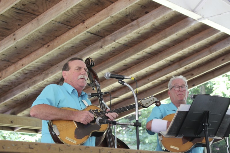 ["Every July, the Mens Club of the Steubenville, Ohio Holy Resurrection Serbian Orthodox Church hosts an annual picnic at their picnic grounds along Kings Creek in Weirton, West Virginia. The event serves as both a fundraiser for the Mens Club and a homecoming for Weirton and Steubenvilles Serbian Community. The event features Serbian music, dance, food, and drink. Mens Club members roast chickens and lambs on spits over open wood fires and sell them to picnic attendees. The spits were constructed out of material from Weirton Steel by Mens Club members and Weirton Steel employees in the 1960s. Other food served at the picnic includes pogacha (a type of Serbian bread), haluski or cabbage and noodles, cevaps (a pork, lamb, and beef sausage), strudel, nut rolls, beer, and Slivovitz.In 2017, state folklorist Emily Hilliard attended the Serbian picnic with Brynn Kusic, whose fathers family is part of the Weirton Serbian community. In 2019, Hilliard attended with a WVPB film crew to capture additional video footage and audio tape for a short video documentary (see below).Learn more about the Annual Picnic via the Holy Resurrection Serbian Orthodox Church: https://www.hrsoc-steubenville.org/annual-picnicSee the short video and audio documentary about the Chicken Blasts, produced by the West Virginia Folklife Program and West Virginia Public Broadcasting: https://wvfolklife.org/2020/01/27/weirtons-serbian-heritage-is-a-chicken-blast/ https://www.youtube.com/watch?v=XpGF-MFUlhYhttps://soundcloud.com/wvpublicnews/weirtons-serbian-heritage-is-a-chicken-blast"]%